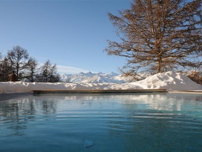Hotels an der Piste - Skiservice: Wachsservice - Skigebiet Meran 2000 - Outdoor Pool - Wohlfühlhotel Falzeben