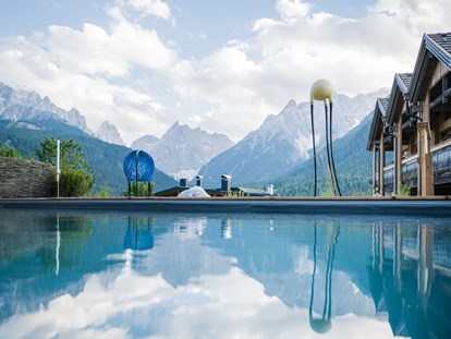 Hotels an der Piste - Verpflegung: 3/4 Pension - Skigebiet 3 Zinnen Dolomites - Naturbadeteich - Berghotel Sexten Dolomiten
