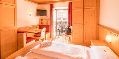 Hotels an der Piste - Skiraum: videoüberwacht - Moos/Pass - 2-3 Bett-Zimmer mit Balkon - Piccolo Hotel Gurschler