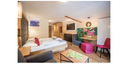 Hotels an der Piste - Parkplatz: kostenlos beim Hotel - Selva di val Gardena - Familienhotel Huber