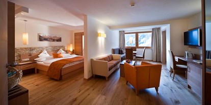 Hotels an der Piste - Sonnenterrasse - Wolkenstein-Gröden - Familienzimmer Margerite - Familienhotel Huber