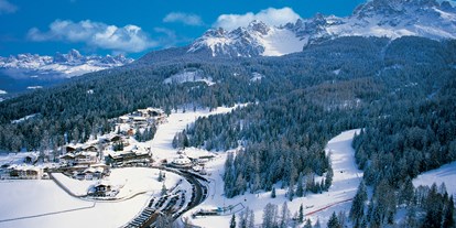 Hotels an der Piste - Preisniveau: gehoben - Selva di val Gardena - Winterlandschaft rund um das Hotel - Sporthotel Obereggen