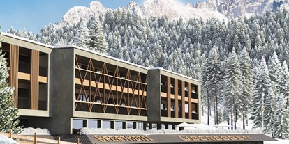 Hotels an der Piste - Preisniveau: gehoben - Selva di val Gardena - Hotelfassade im Winter - Sporthotel Obereggen