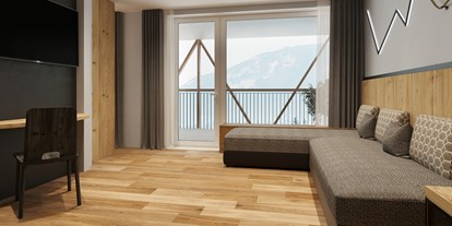 Hotels an der Piste - Preisniveau: gehoben - Selva di val Gardena - "Torre di Pisa" Panorama Suite Wohnbereich - Sporthotel Obereggen