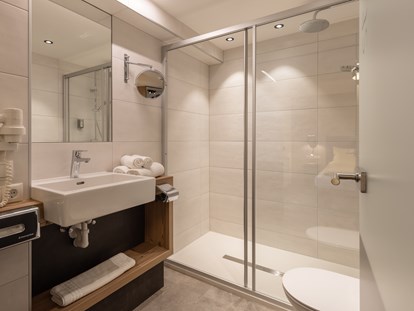 Hotels an der Piste - Hotel-Schwerpunkt: Skifahren & Romantik - Sölden (Sölden) - Badezimmer Junior Suite Typ C - stefan Hotel