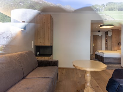 Hotels an der Piste - Preisniveau: gehoben - Tiroler Oberland - Wohnbereich Junior Suite Typ C - stefan Hotel