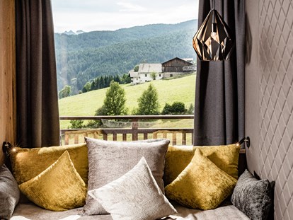 Hotels an der Piste - Hotel-Schwerpunkt: Skifahren & Wellness - Wolkenstein (Trentino-Südtirol) - Hotel Sonnenberg Kuschelecke Vitalsuite - Hotel Sonnenberg - Alpine Spa Resort