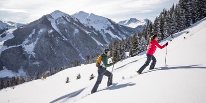Hotels an der Piste - Skiservice: Wachsservice - Dienten am Hochkönig - Schneechuhwandern - Ski & Bike Hotel Wiesenegg