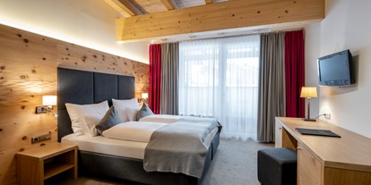 Hotels an der Piste - Skicircus Saalbach Hinterglemm Leogang Fieberbrunn - Zimmeransicht - Ski & Bike Hotel Wiesenegg