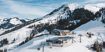 Hotels an der Piste - geführte Skitouren - Königsleiten - Die KRAFTalm  und liegt mitten in der SkiWelt Wilder Kaiser - Brixental direkt an der Mittelstation der neuen 10er Gondelbahn Salvistabahn - KRAFTalm