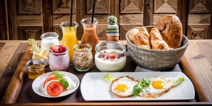 Hotels an der Piste - Skiverleih - Ellmau - Frühstück bis 12.00 Uhr | für einen entspannten Tag - Kaiserlodge