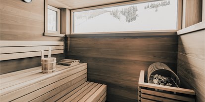 Hotels an der Piste - geführte Skitouren - Skigebiet Zauchensee-Flachauwinkl - Die eigene, private Sauna in unserer Panorama Suite - FIRSTpeak Zauchensee