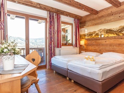 Hotels an der Piste - Hotel-Schwerpunkt: Skifahren & Ruhe - Ferienwohnung mit Aussicht auf Hinterglemm und auf die umliegende Pinzgauer Bergwelt  - Ferienwohnungen Perfeldhof