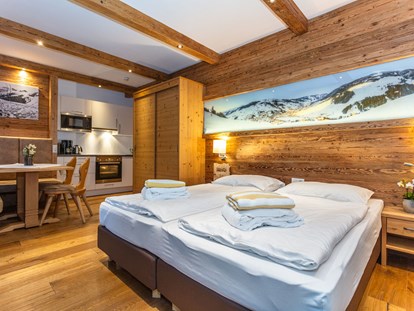 Hotels an der Piste - Hotel-Schwerpunkt: Skifahren & Wellness - Appartement direkt an der Piste in Hinterglemm  - Ferienwohnungen Perfeldhof