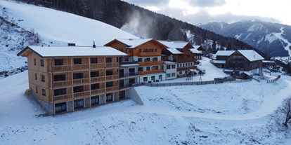 Hotels an der Piste - Ski-In Ski-Out - Schladming-Dachstein - Hotel Breilerhof in Schladming-Dachstein, direkt an der Piste, Planai, Schladming, Pistenhotel Familienurlaub, Biobauernhof, vom Bett aufs Brett - Hotel Breilerhof