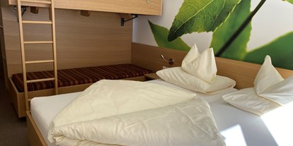 Hotels an der Piste - Skiraum: Skispinde - Graubünden - Panorama- und Podestzimmer - Smart-Hotel