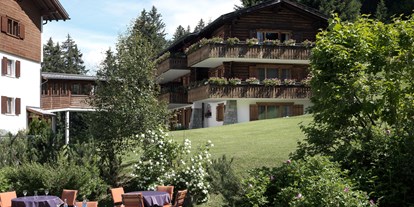 Hotels an der Piste - Parkplatz: gebührenpflichtig beim Hotel - Davos Platz - Gartenterrasse - Hotel Dieschen