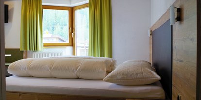 Hotels an der Piste - Verpflegung: Frühstück - Galtür - Doppelzimmer Deluxe - Hotel Edi