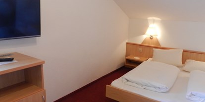 Hotels an der Piste - Hotel-Schwerpunkt: Skifahren & Ruhe - St. Gallen - Doppel- bis 4-Bett - Familienzimmer DU/WC - TV  - Hotel Pizzeria Mittenwald Flumserberg Tannenheim
