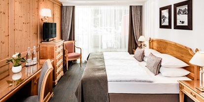 Hotels an der Piste - Parkplatz: kostenlos beim Hotel - Karersee - Hotel Alpenroyal