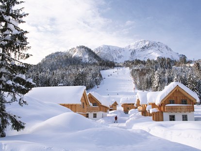 Hotels an der Piste - Steiermark - Hüttendorf im Winter - AlpenParks Aktiv & Natur Resort Hagan Lodge Altaussee