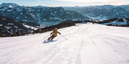 Hotels an der Piste - Hotel-Schwerpunkt: Skifahren & Familie - Dienten am Hochkönig - Skifahren auf der Zeller Schmittenhöhe mit Seeblick - Hotel Sonnblick