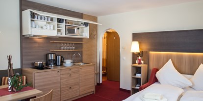 Hotels an der Piste - Wellnessbereich - Abtenau - Appartement Quartett Harmls Aparthotel Flachau - Harmls Aparthotel