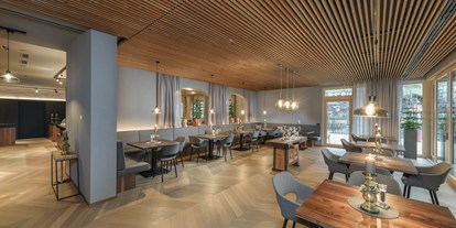 Hotels an der Piste - Skiservice: vorhanden - Flachau - lichtdurfluteter Wintergarten für echte Genussmomente - 4* Hotel Bergzeit 
