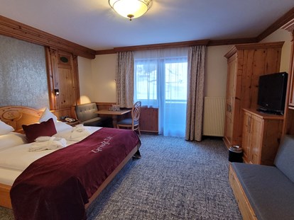 Hotels an der Piste - Sonnenterrasse - Filzmoos (Filzmoos) - Komfortzimmer für bis zu 4 Personen möglich - **** Hotel Alpenrose Zauchensee