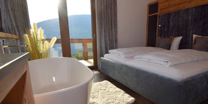 Hotels an der Piste - Sauna - Achenkirch - Alpinloft Goldsun Masterbedroom - Chalets & Apartments Wachterhof