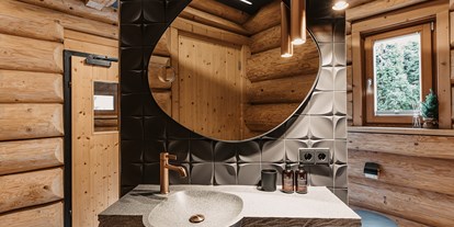 Hotels an der Piste - Sauna - Gosau - Badezimmer Little Beaver - WoodRidge Luxury Chalets