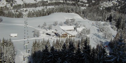 Hotels an der Piste - Ladestation Elektroauto - Oberösterreich - Sturmgut - eingebettet zwischen Talabfahrt und Gondelbahn - Berghof Sturmgut