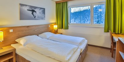 Hotels an der Piste - Skiraum: Skispinde - Skigebiet Axamer Lizum - Doppelzimmer - Hotel Lizum 1600