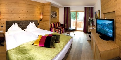 Hotels an der Piste - Skiraum: Skispinde - Lech - Doppelzimmer Superior Garten - Hotel Gotthard