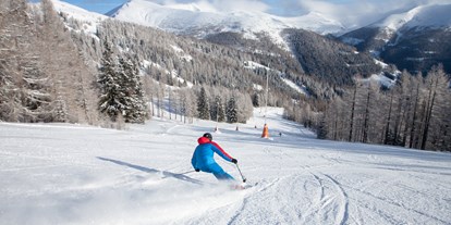 Hotels an der Piste - Skiservice: Skireparatur - Nockberge - Skigebiet Bad Kleinkirchheim - Genusshotel Almrausch