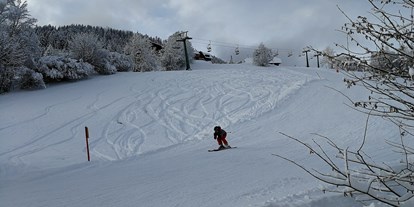 Hotels an der Piste - Skiservice: Skireparatur - Skigebiet Bad Kleinkirchheim - Skipiste - nur wenige Meter vom Hotel - Genusshotel Almrausch
