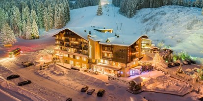 Hotels an der Piste - Ski-In Ski-Out - Tannheimertal - Hotel Sonnenhof - direkt an der Piste und Skigebiet Füssener Jöchle in Grän im Tannheimer Tal Fotocredit Ilja Kagan. - Hotel Sonnenhof 