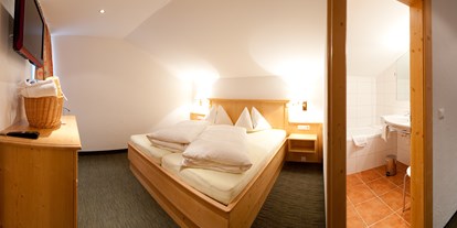 Hotels an der Piste - Hotel-Schwerpunkt: Skifahren & Familie - Rennweg (Rennweg am Katschberg) - Schlafzimmer Suite "Nockberge - Hotel Berghof