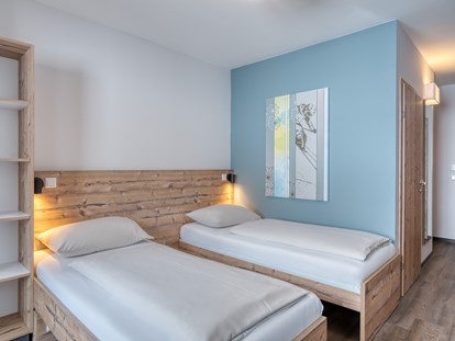Hotels an der Piste - Verpflegung: Halbpension - Ebene Reichenau - Kaiserburg Zimmer - COOEE alpin Hotel Bad Kleinkirchheim