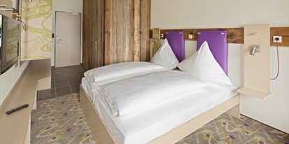Hotels an der Piste - Parkplatz: gebührenpflichtig beim Hotel - Samnaun Dorf - Explorer Hotel Montafon 
