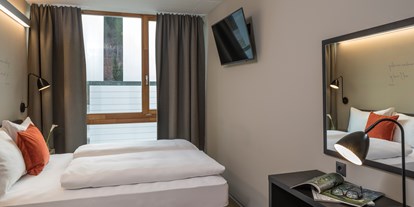 Hotels an der Piste - Hotel-Schwerpunkt: Skifahren & Familie - Skigebiet Nassfeld - Doppelzimmer M - Arena Franz Ferdinand Nassfeld