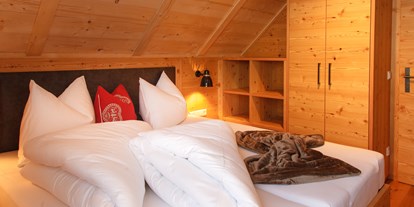 Hotels an der Piste - WLAN - Skigebiet Bad Kleinkirchheim - Schlafzimmer - Trattlers Hof-Chalets