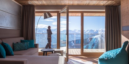 Hotels an der Piste - Suite mit offenem Kamin - Salzburg - der erste Blick aus Ihrem Bett über die atemberaubenden Tauern - Panorama Alm