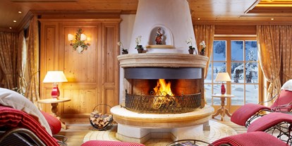Hotels an der Piste - Pools: Außenpool beheizt - Kühtai - Ruheraum mit offenem Kamin - Hotel Singer - Relais & Châteaux
