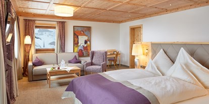 Hotels an der Piste - Suite mit offenem Kamin - Skiarena Berwang - Hönig - Deluxe Junior Suite - Hotel Singer - Relais & Châteaux