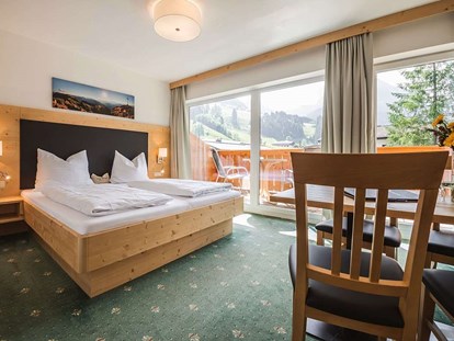 Hotels an der Piste - Verpflegung: All-inclusive - Shuttleberg Flachauwinkl - Kleinarl - Familienzimmer Typ B - Familienhotel Botenwirt ***S