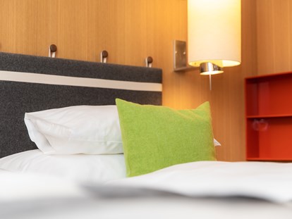 Hotels an der Piste - Kitzbühel - Zimmer/Suite Typ "Design" - Erstklassig & down to Earth - das bio-zertifizierte Gartenhotel Theresia****S 