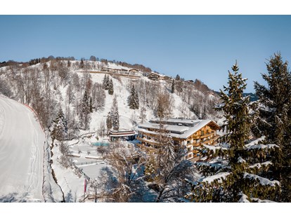 Hotels an der Piste - Hotel-Schwerpunkt: Skifahren & Wellness - Gartenhotel Theresia in Saalbach-Hinterglemm
"Vom Frühstück auf die Piste, von der Piste in die Pools" - Erstklassig & down to Earth - das bio-zertifizierte Gartenhotel Theresia****S 